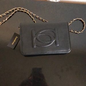 Brand new with tags BeBe crossbody purse